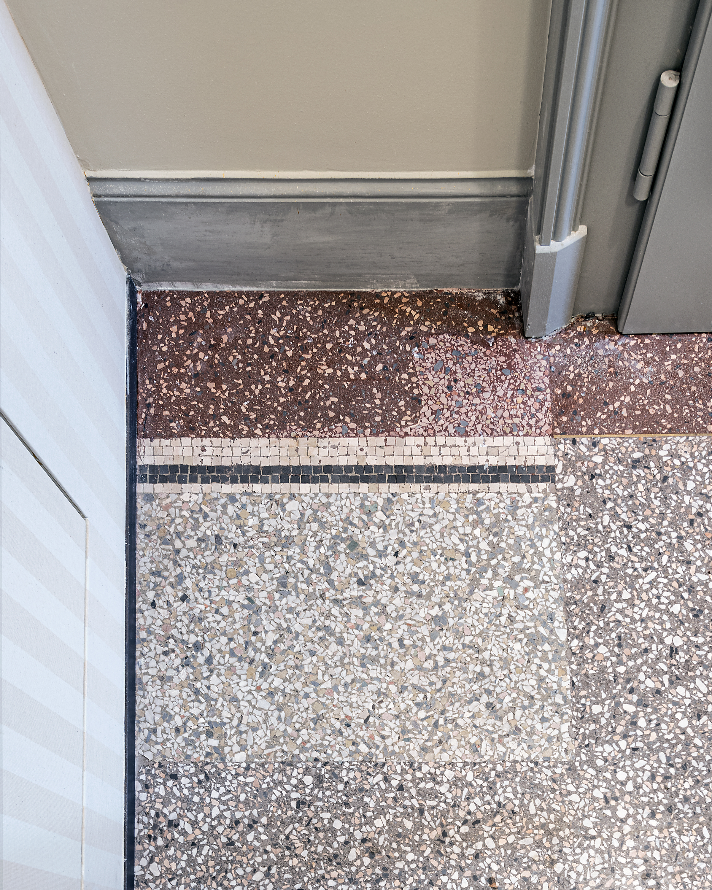 Gemusterter Terrazzoboden im Treppenhaus mit historischen Reststücken